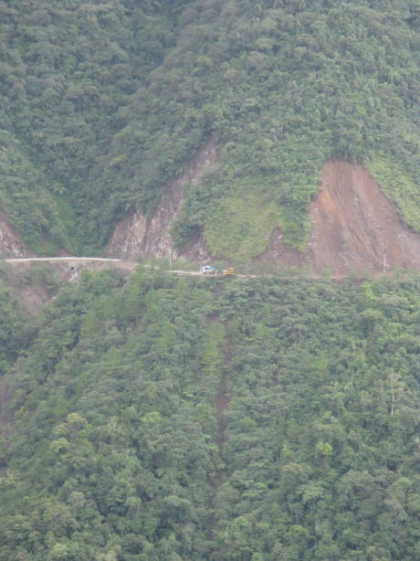 The delivery truck, with the processing machines,  crawls along the Banuae-Bontoc road